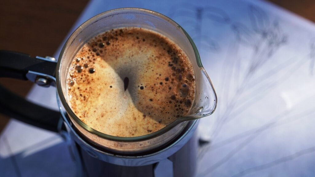 Download gratis kaffevarmer til stempelkande mønster